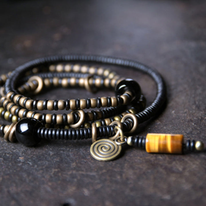 Ebony wood Dzi bead and copper bracelet — view 7