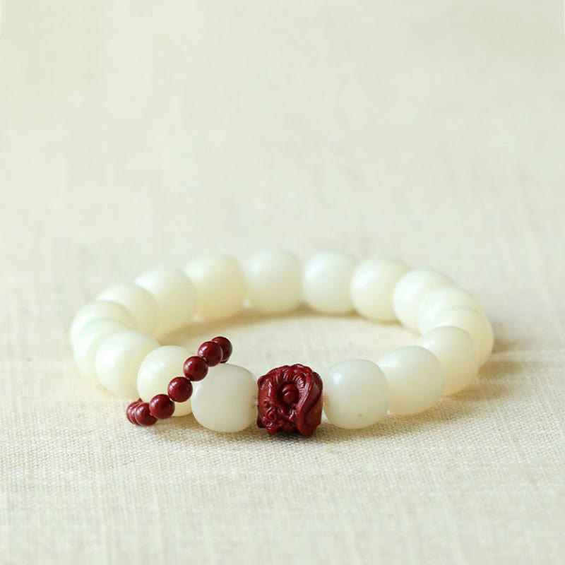 Bodhi Seed Cinnabar Dancing Lion Wrist Mala — main product view