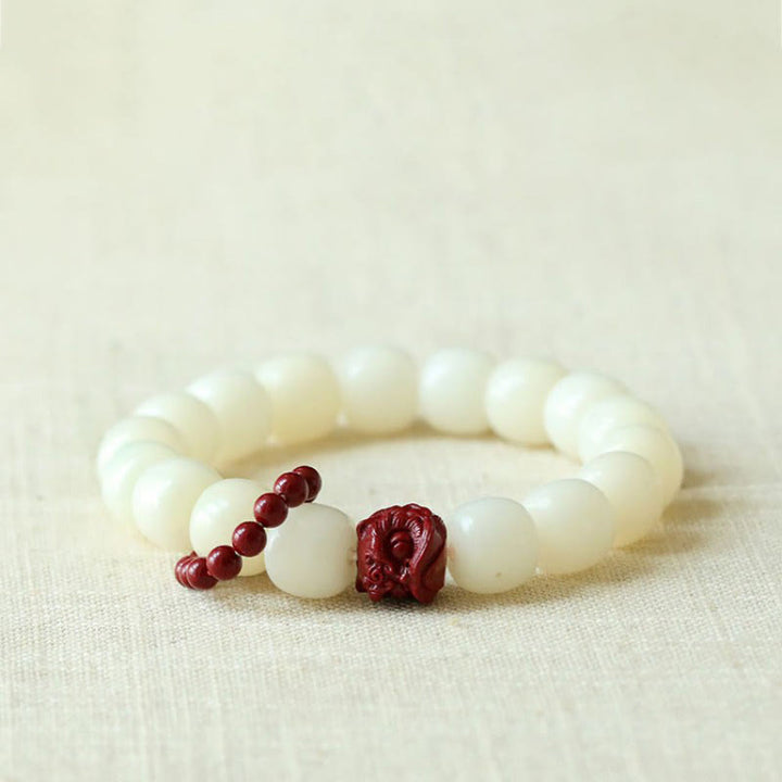 Bodhi Seed Cinnabar Dancing Lion Wrist Mala — main product view