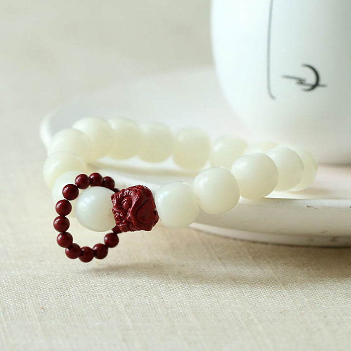 Bodhi Seed Cinnabar Dancing Lion Wrist Mala — product view 3