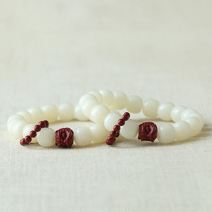 Bodhi Seed Cinnabar Dancing Lion Wrist Mala — product view 5