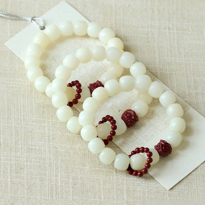 Bodhi Seed Cinnabar Dancing Lion Wrist Mala — product view 6