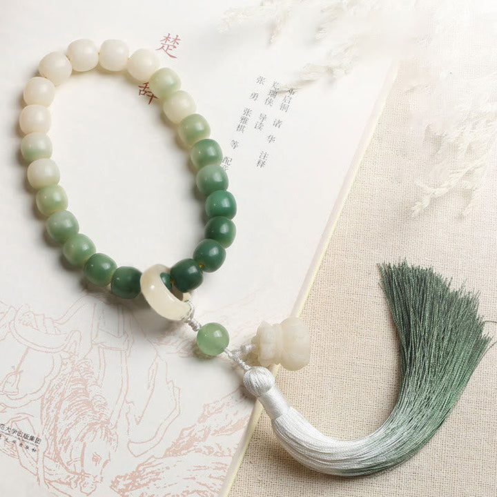 Gradient Bodhi Seed Money Bag Lotus Wrist Mala — main product view