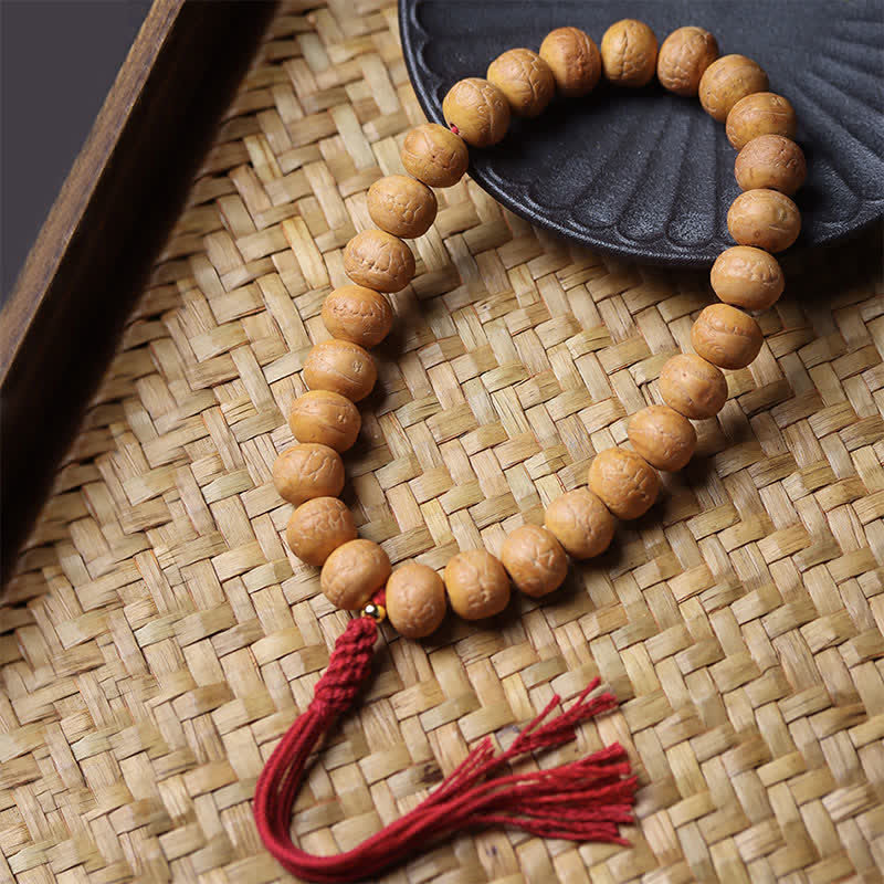 Phoenix Eye Bodhi Tibetan Engraved Wrist Mala — main product view