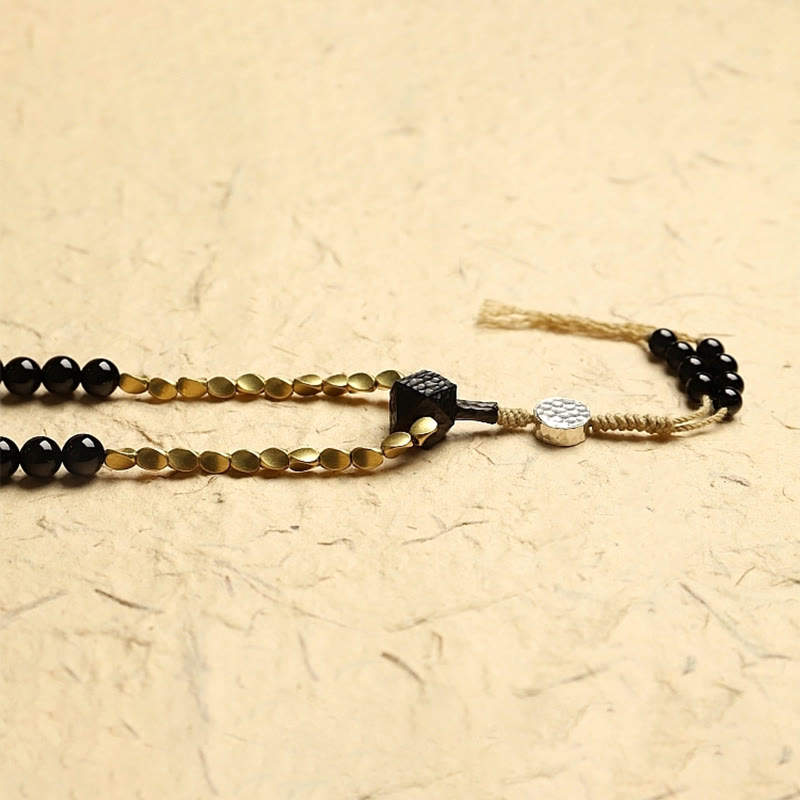 Tibetan Black Onyx Three-Eyed Dzi Beads 108-Bead Mala Bracelet — product view 8