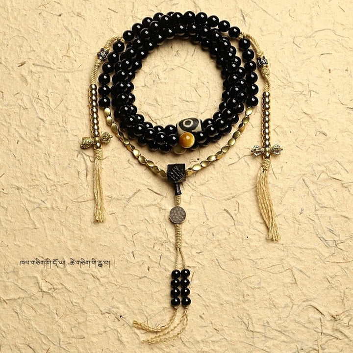 Tibetan Black Onyx Three-Eyed Dzi Beads 108-Bead Mala Bracelet — product view 10