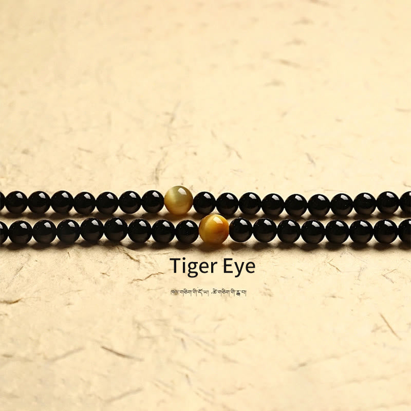 Tibetan Black Onyx Three-Eyed Dzi Beads 108-Bead Mala Bracelet — product view 16