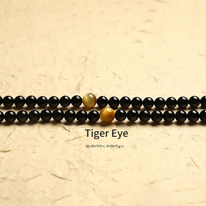 Tibetan Black Onyx Three-Eyed Dzi Beads 108-Bead Mala Bracelet — product view 16